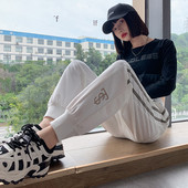 Naiste kevadised tikandiga spordipüksid