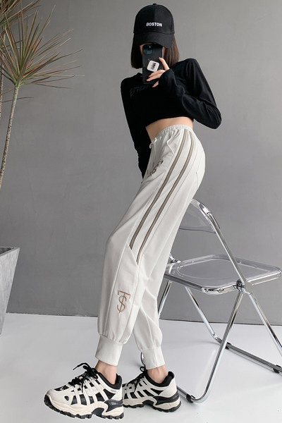 Naiste kevadised tikandiga spordipüksid