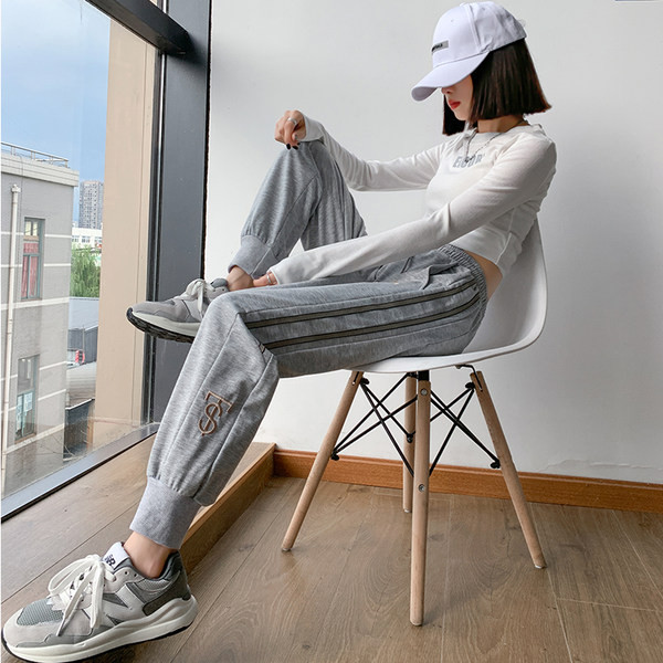 Naiste kevadised tikandiga spordipüksid