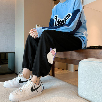 Γυναικείο αθλητικό παντελόνι με απλικέ και κορδόνια