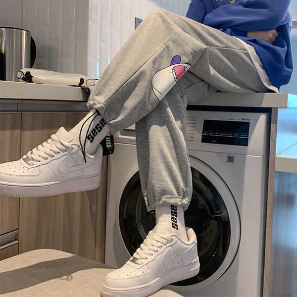 Γυναικείο αθλητικό παντελόνι με απλικέ και κορδόνια