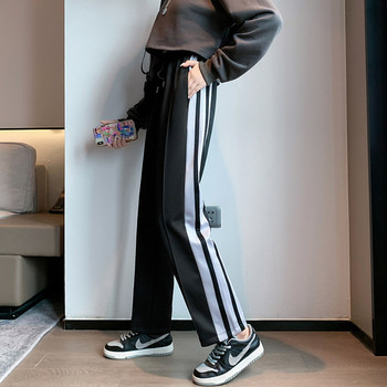 Дамски панталон с кант в черен цвят 