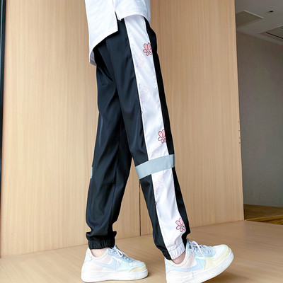 Γυναικείο αθλητικό και casual παντελόνι με μαύρο και ροζ στάμπα