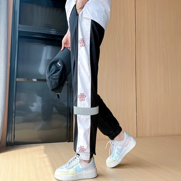 Γυναικείο αθλητικό και casual παντελόνι με μαύρο και ροζ στάμπα