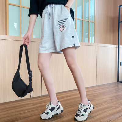 Casual παντελόνι με κέντημα και κουμπιά