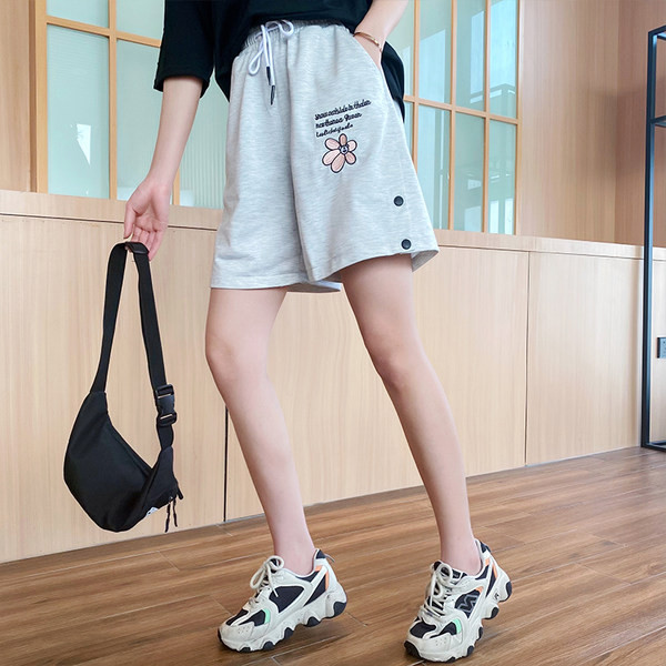 Casual παντελόνι με κέντημα και κουμπιά