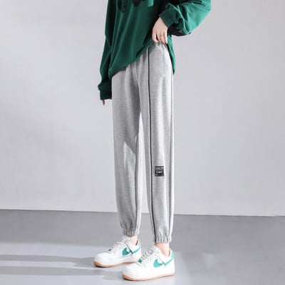 Γυναικείο αθλητικό παντελόνι με ψηλόμεσο και έμβλημα