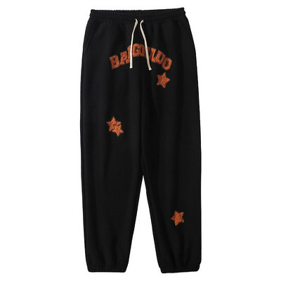 Спортно долнище с бродиран надпис 