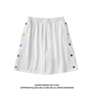 Naiste lipsude ja värviliste nööpidega lühikesed püksid