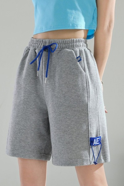 Naiste lipsudega lühikesed püksid halli ja musta värviga