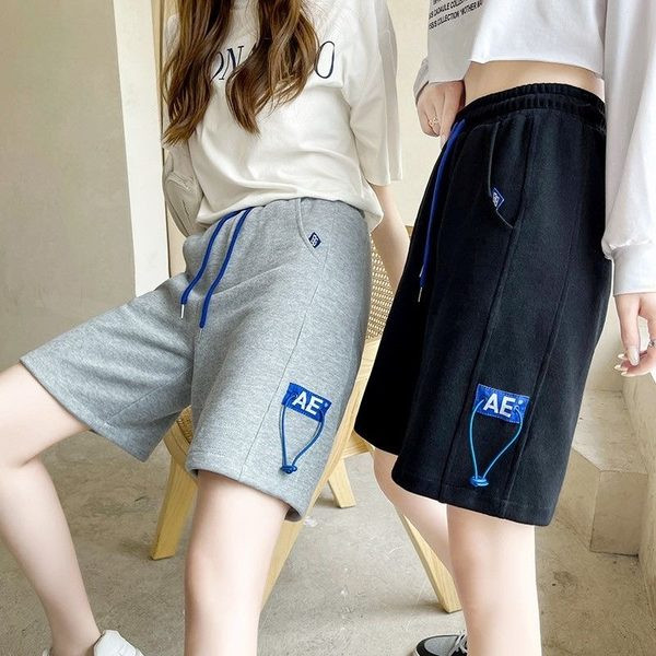 Naiste lipsudega lühikesed püksid halli ja musta värviga