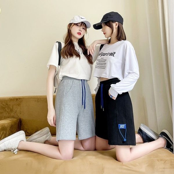 Naiste lipsudega lühikesed püksid halli ja musta värviga