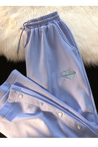 Καθημερινή φόρμα με σκισίματα και κουμπιά στα πόδια