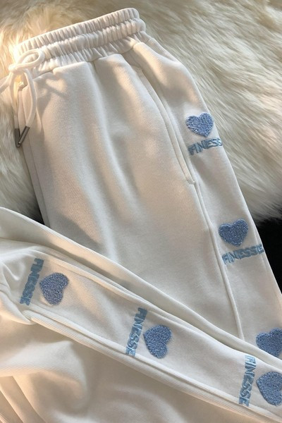 Αθλητικό παντελόνι με κορδόνια και κεντητή επιγραφή για γυναίκες