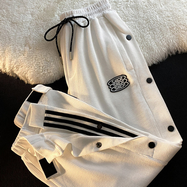 Дамски спортен панталон с копчета и връзки 