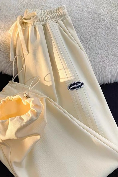 Дамско спортно-ежедневно долнище с връзки на глезените