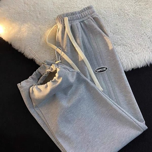 Дамско спортно-ежедневно долнище с връзки на глезените