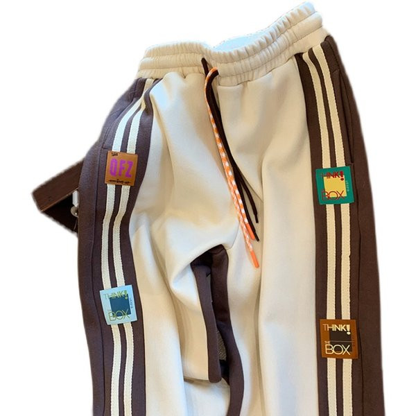 Novi model ženskih sportskih hlača s aplikacijom i vezicama