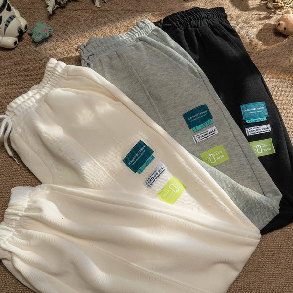 Дамски спортен панталон с емблема и връзки