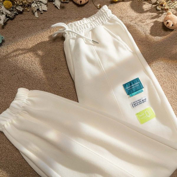 Дамски спортен панталон с емблема и връзки