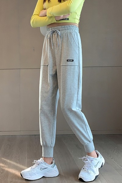 Taskute ja kummikutega spordipüksid