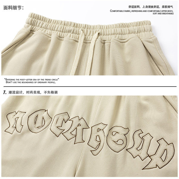 Αθλητικό σορτς με επιγραφή και κορδόνια 