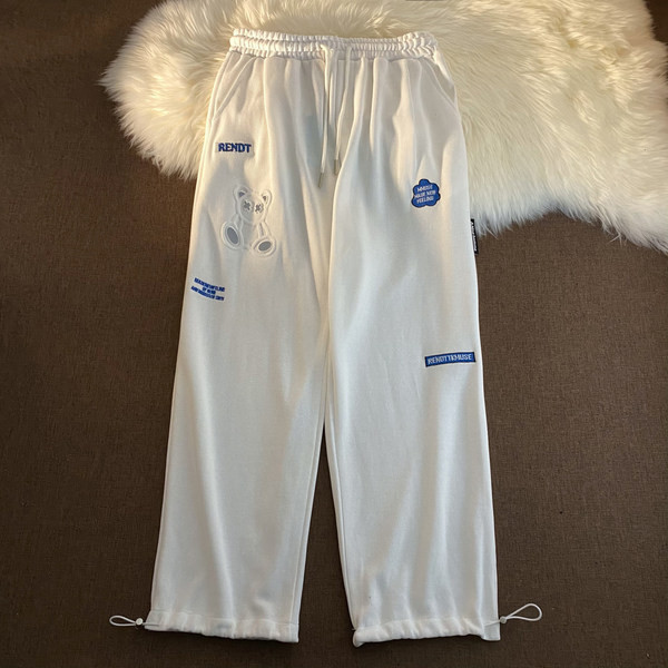 Спортен панталон с апликация и надпис 