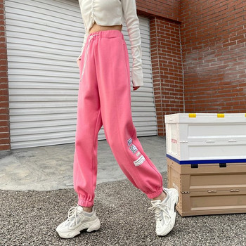 Спортен дамски панталон с емблеми -три цвята