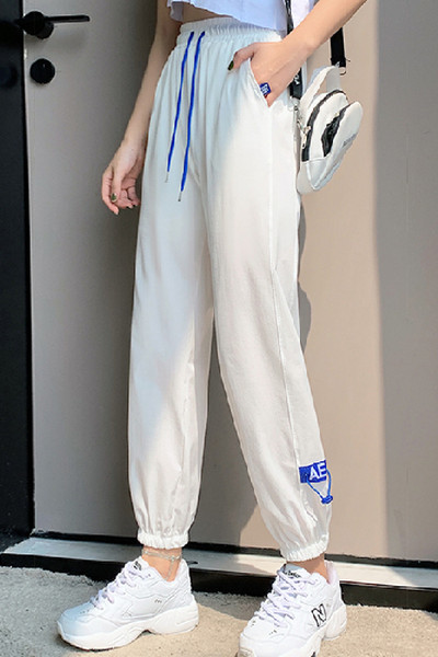 Дамски спортен панталон с ластик на крачилите 