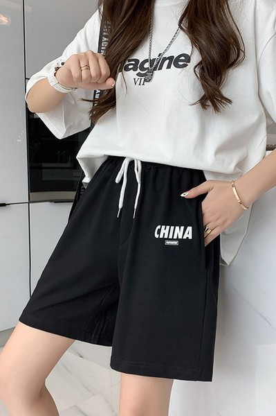 Naiste spordipüksid sirge pealiskirja ja lipsudega mudel