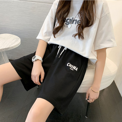 Naiste spordipüksid sirge pealiskirja ja lipsudega mudel