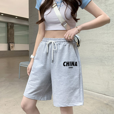 Naiste spordipüksid sirge pealiskirja ja lipsudega mudel