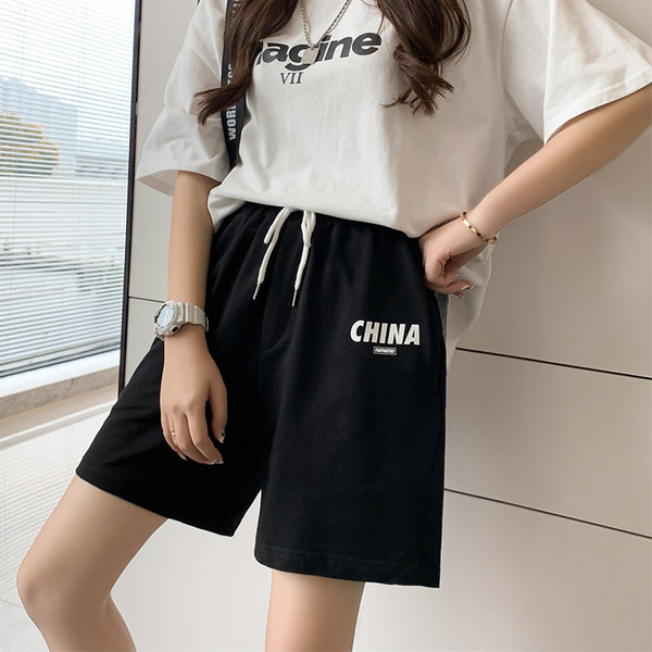 Naiste spordipüksid sirge pealiskirja ja lipsudega mudel