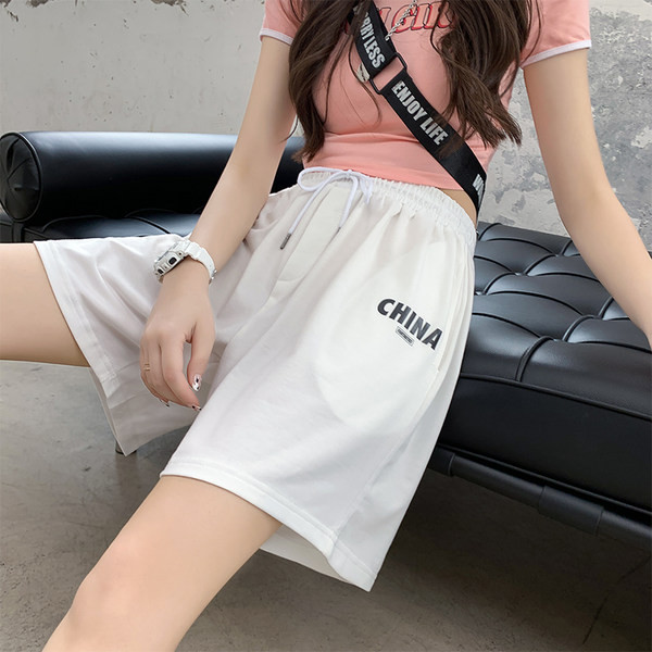 Naiste spordipüksid sirge pealiskirja ja lipsudega mudel