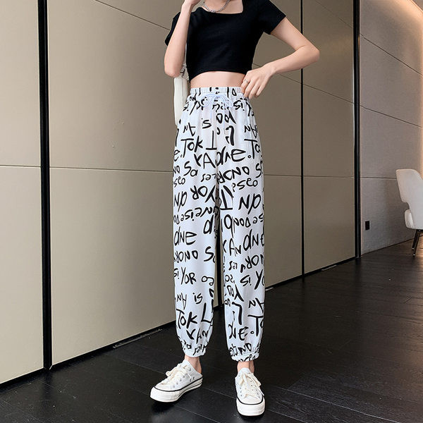 Naiste kirjade ja kõrge vöökohaga püksid