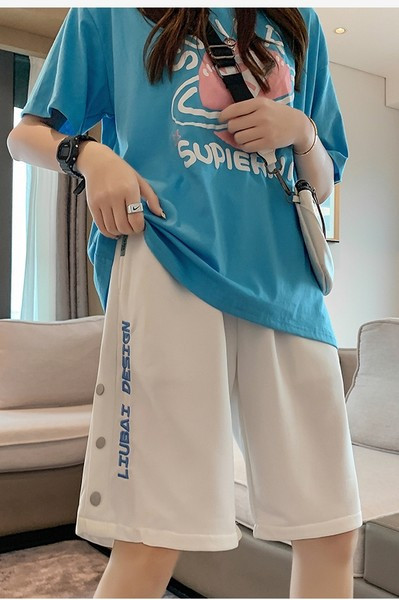 Φαρδύ casual παντελόνι με επιγραφές