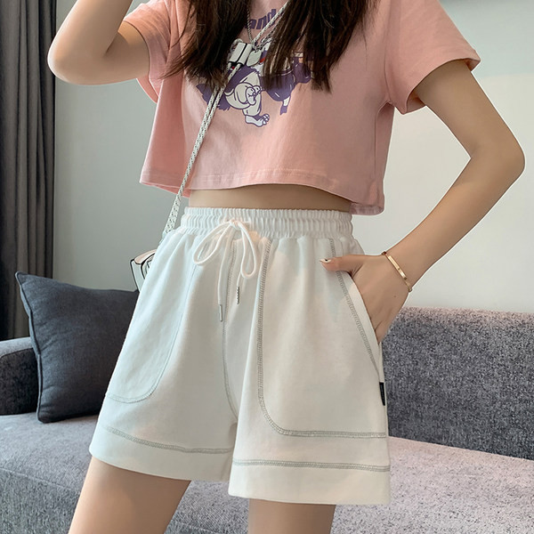 Спортни къси панталони с джоб и връзки за жени