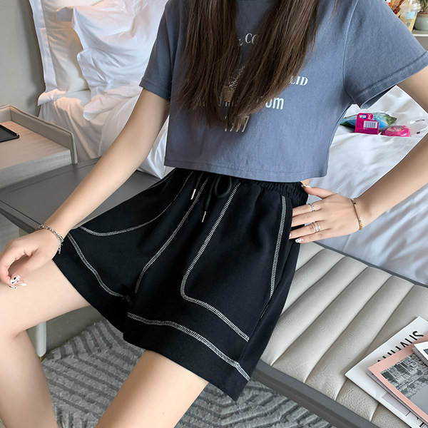 Спортни къси панталони с джоб и връзки за жени