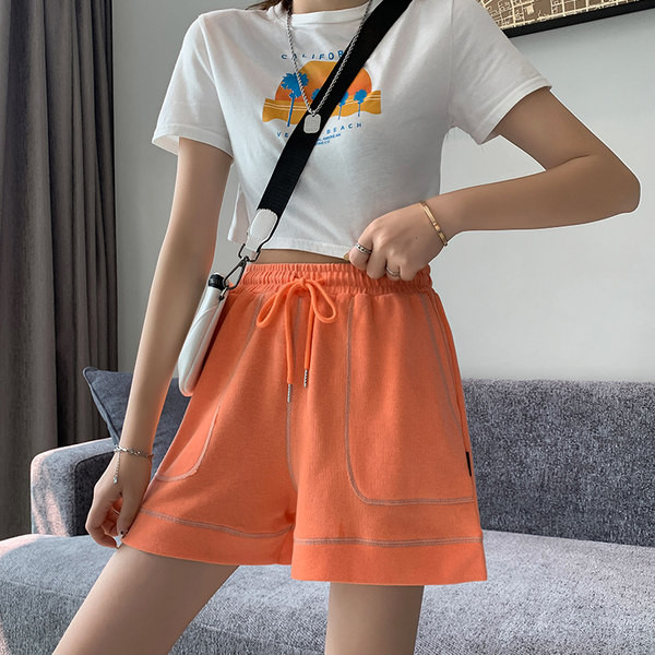 Спортни къси панталони с джоб и връзки за жени