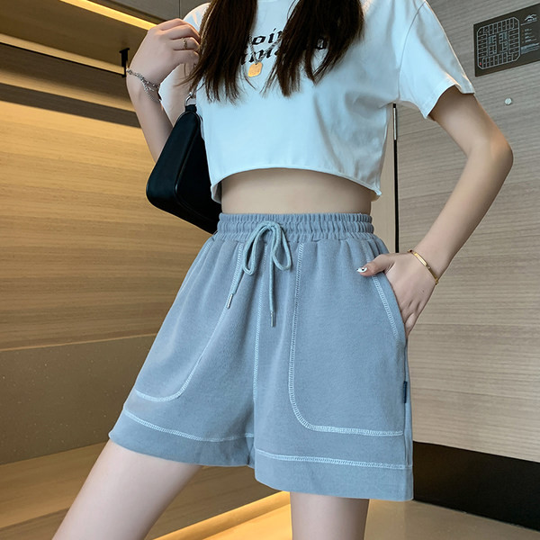 Спортни къси панталони с джоб и връзки за жени