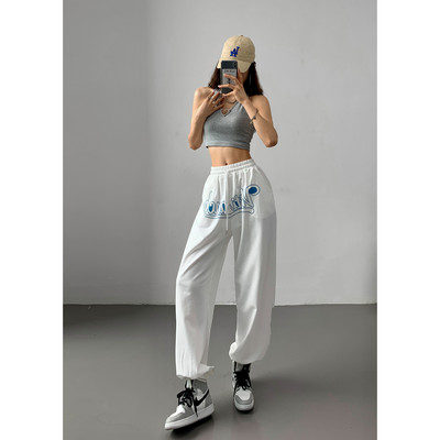 Sportlikud laiad lipsudega ja elastse vöökohaga püksid