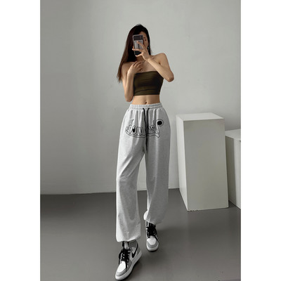 Sportlikud laiad lipsudega ja elastse vöökohaga püksid