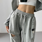 Αθλητικό παντελόνι με σκισμένα μοτίβα και κορδόνια