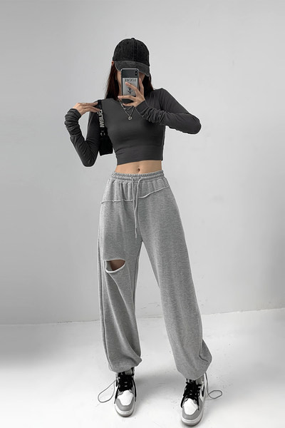 Široke dnevne hlače s poderanim efektom