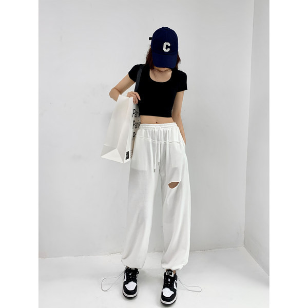 Široke dnevne hlače s poderanim efektom