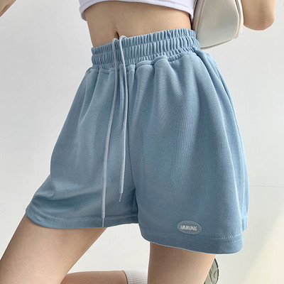 Naiste lühikesed püksid kõrge vöökoha ja lipsudega