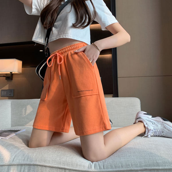 Dressipüksid taskute ja elastse vöökohaga