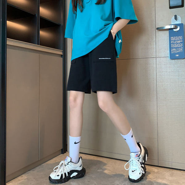 Dressipüksid taskute ja elastse vöökohaga