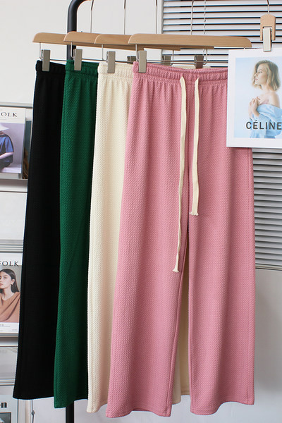 Široke ravne ženske sportske hlače na vezanje