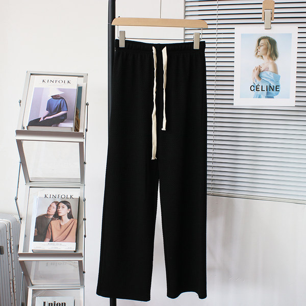 Široke ravne ženske sportske hlače na vezanje